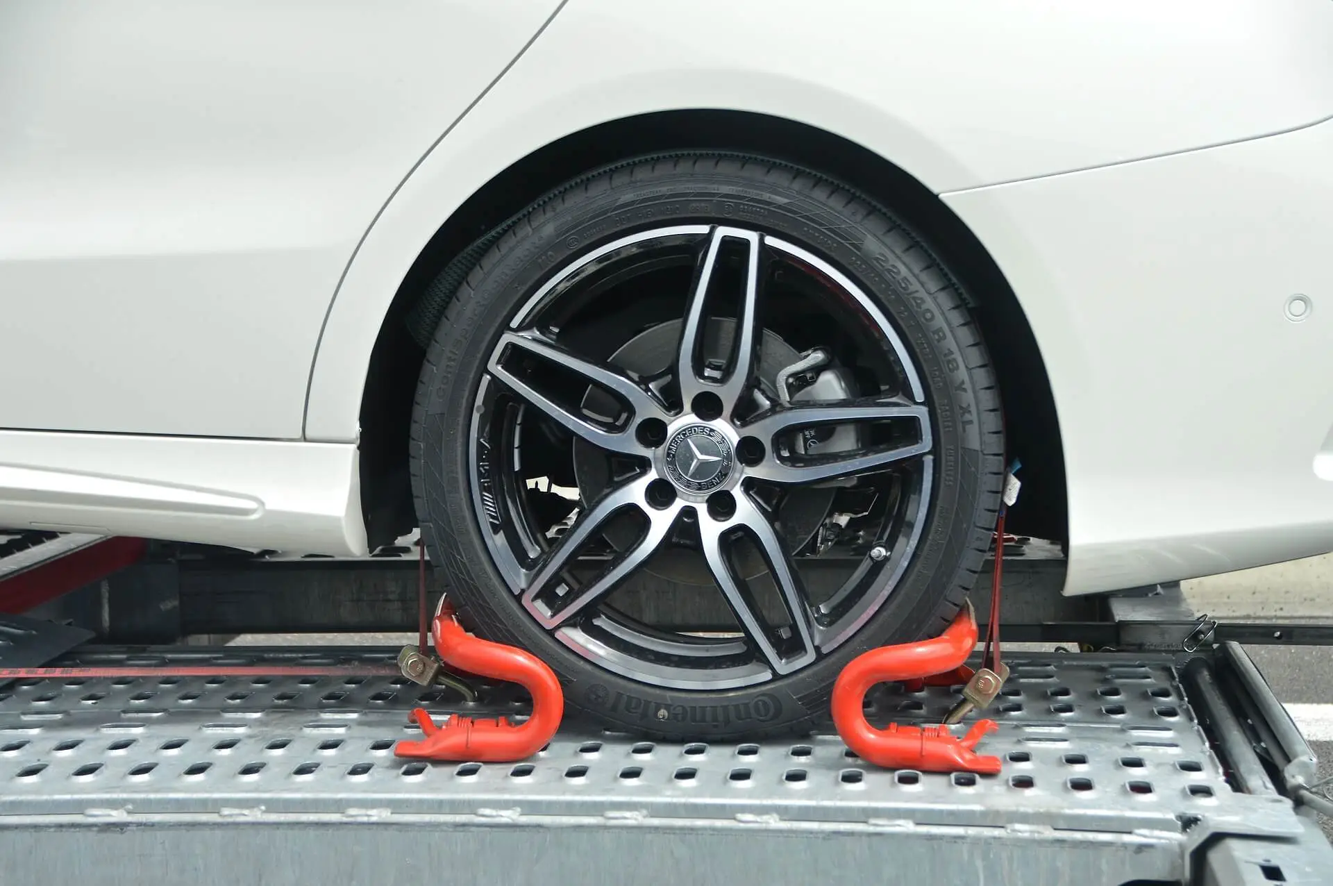 car-tire-trapped-towing background